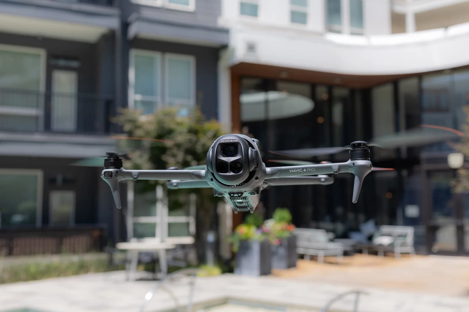 Drone capturing aerial footage outside a property